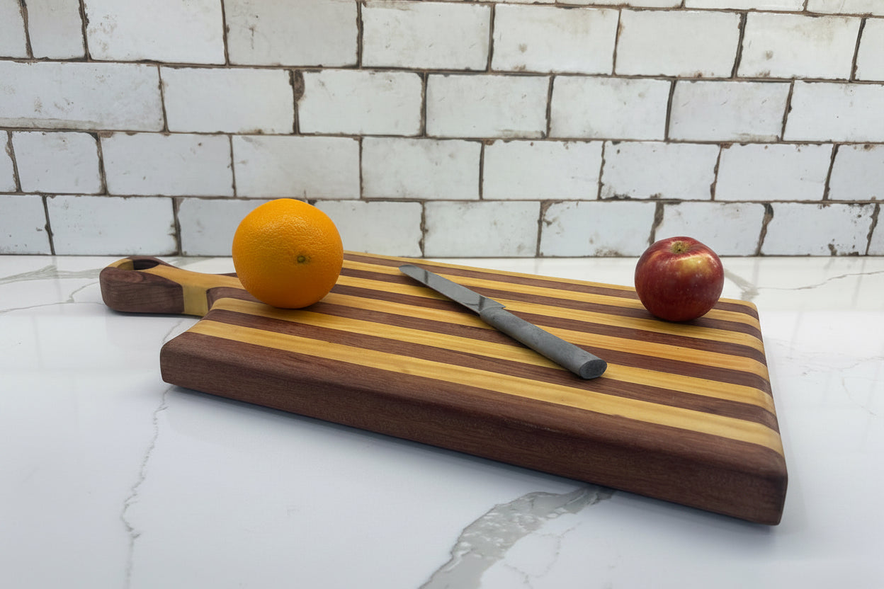Padauk and Yellow Heart striped board - carved handle (Copy)
