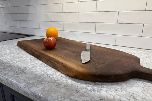 Curly Walnut Serving Board - Carved Handle