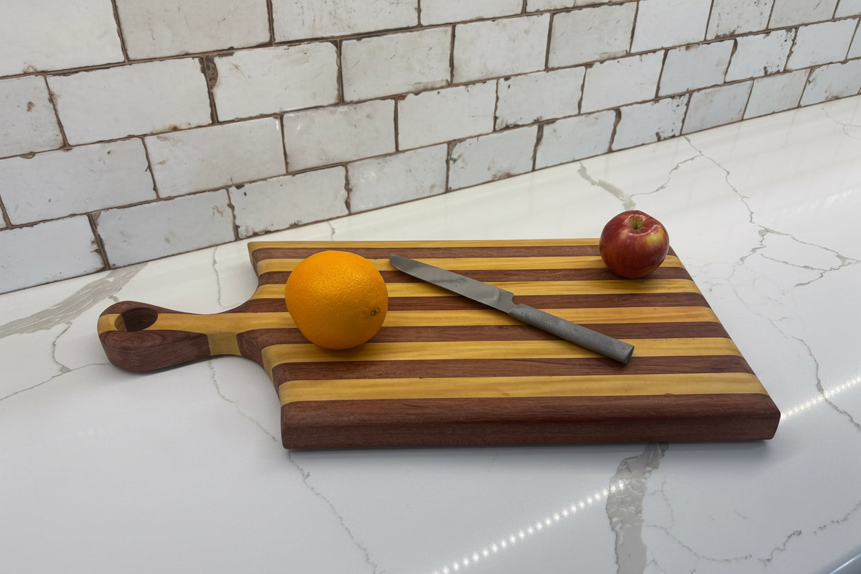 Padauk and Yellow Heart striped board - carved handle (Copy)