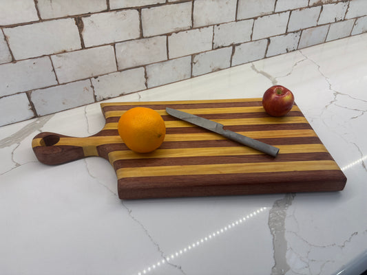 Padauk and Yellow Heart striped board - carved handle
