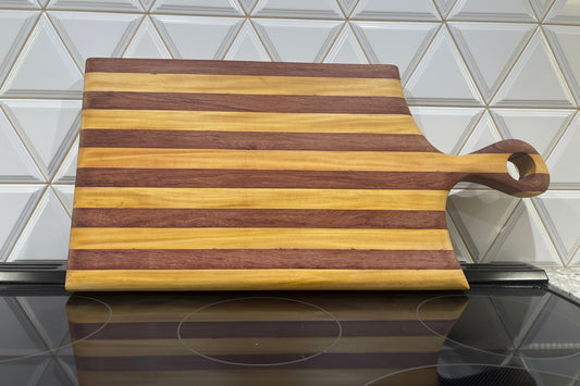 Padauk and Yellow Heart striped board - carved handle (Copy)