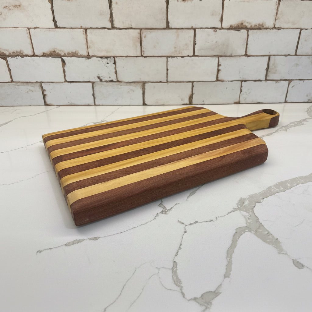 Padauk and Yellow Heart striped board - carved handle