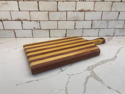 Padauk and Yellow Heart striped board - carved handle