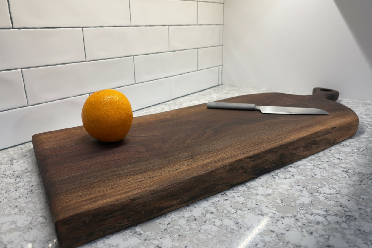 Curly Walnut Serving Board - Carved Handle